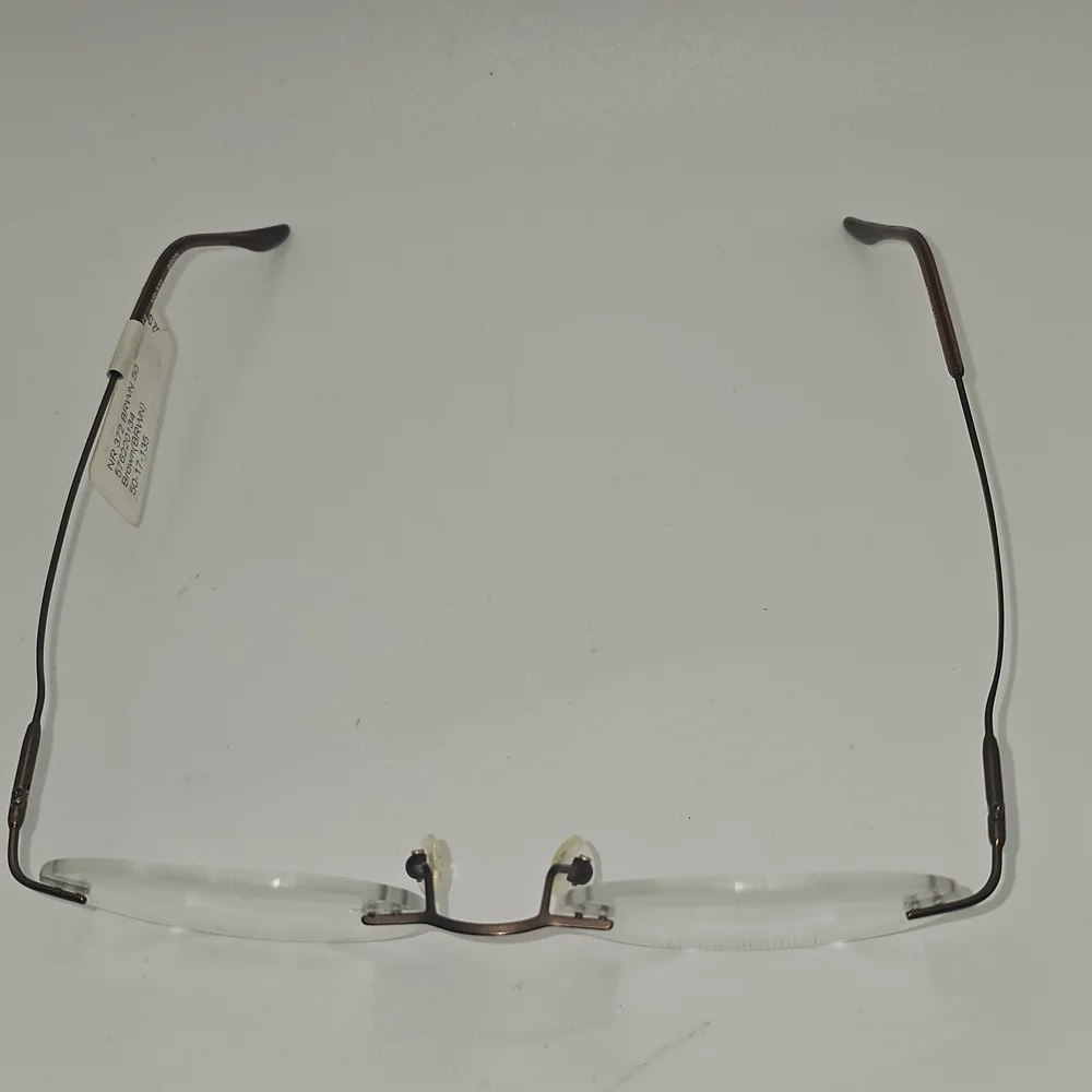 Naturally‎ Rimless NR 372 Eyeglasses Frame 50-17-135 Brown